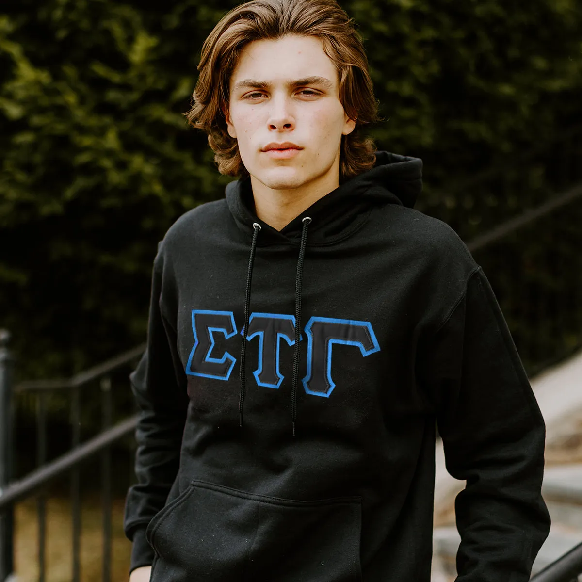 Sig Tau Black Hoodie with Black Sewn On Letters